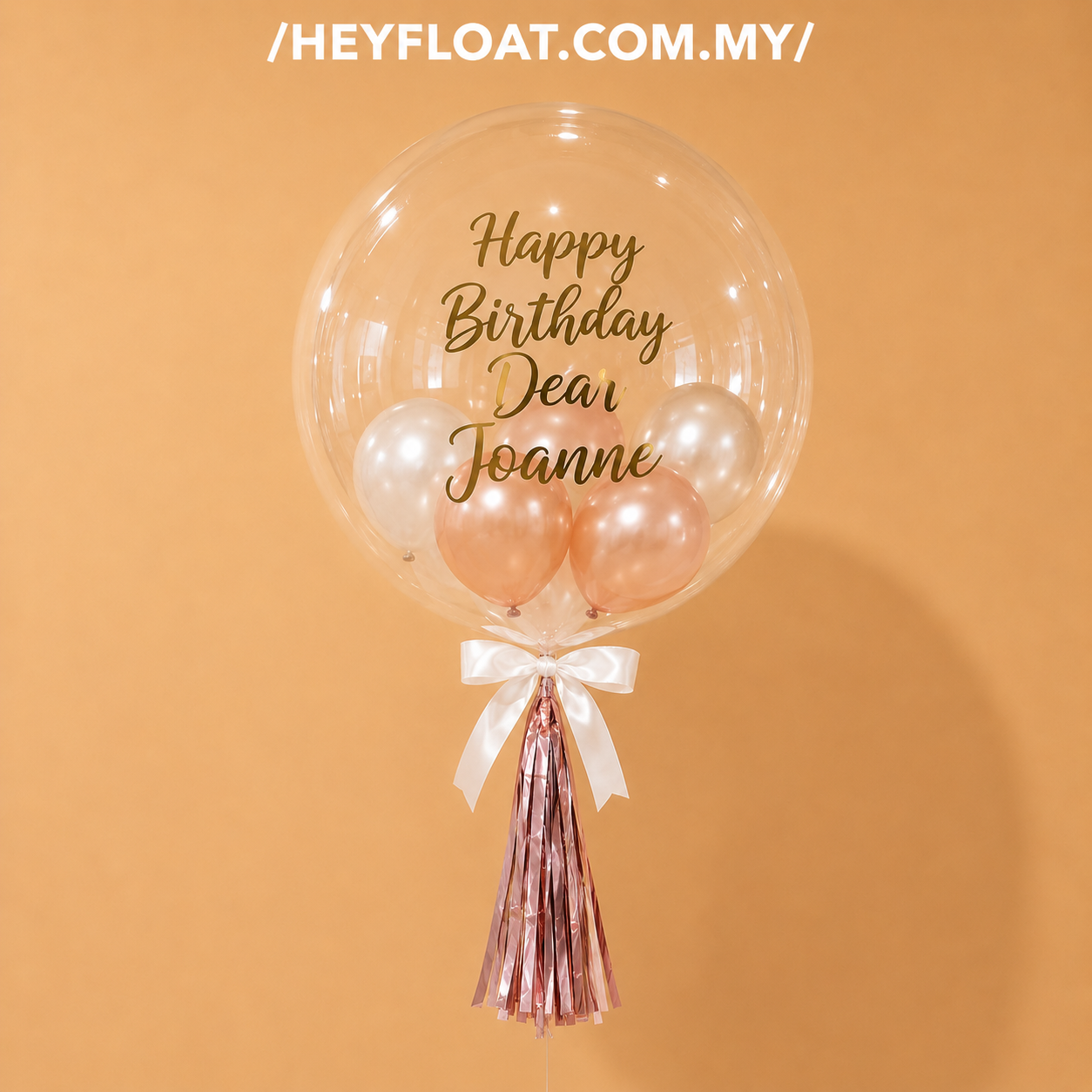 Personalised Olivia birthday bubble balloon with mini balloons and tassel in Penang