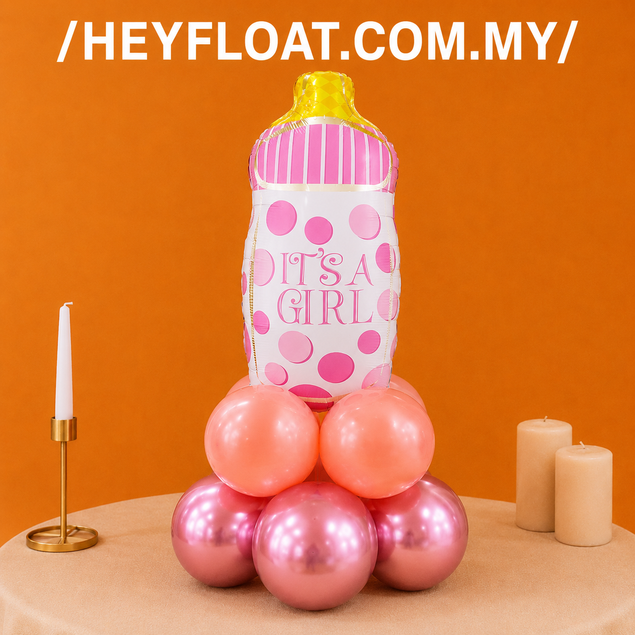 Pink baby bottle balloon column for an It's a Girl baby shower in Penang, Malaysia